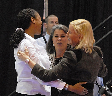 Coach Ann Schilling (right) and her assistant coaches celebrate Bayside Academy's ninth straight state volleyball championship after the 2010 Class 3A finals. (Photo courtesy creativefx)