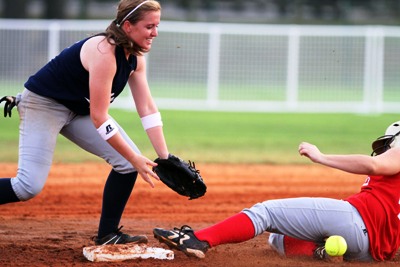 South's Tiffany Schultz of Wetumpka slides safely into second base as Erin Hornsby of Spain Park awaits low throw during softball action. (Photo courtesy creative fx)